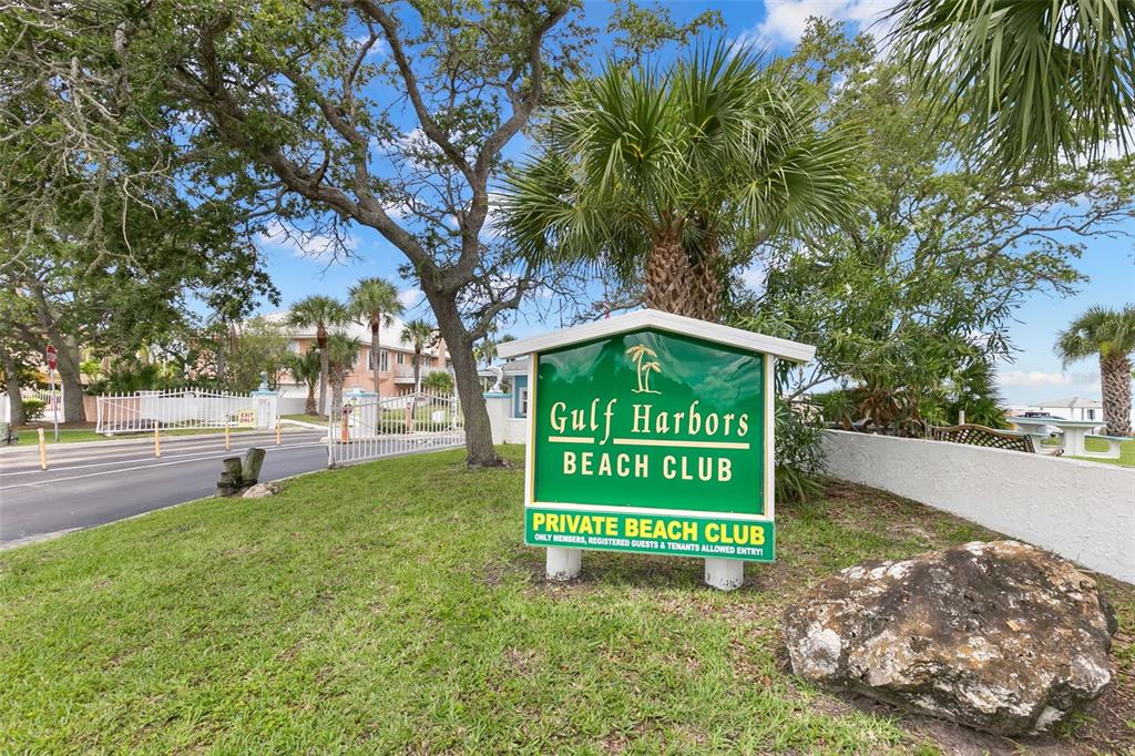 4003 Headsail Drive New Port Richey, FL 34652 - Photo 47 of 50 a sign that is sitting on a brick wall with a big yard