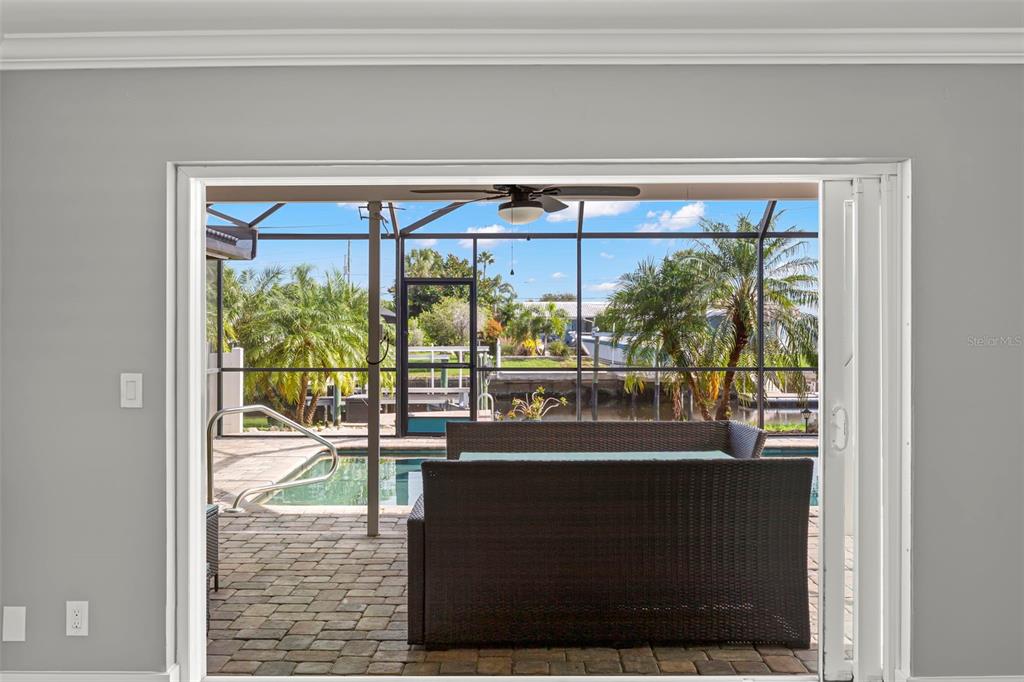 4003 Headsail Drive New Port Richey, FL 34652 - Photo 9 of 50 a room with a floor to ceiling window and an outdoor view