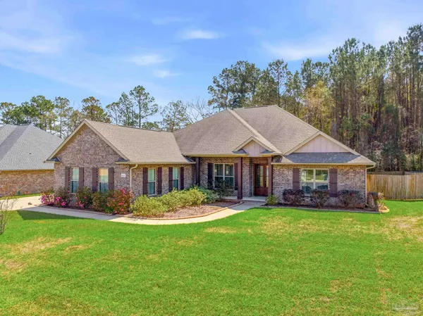 front view of a house with a yard