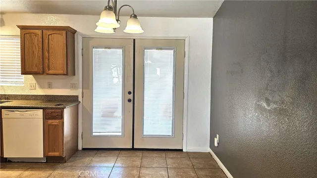 a view of a entryway with a hallway