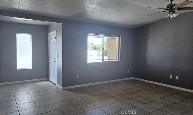 en empty room with windows