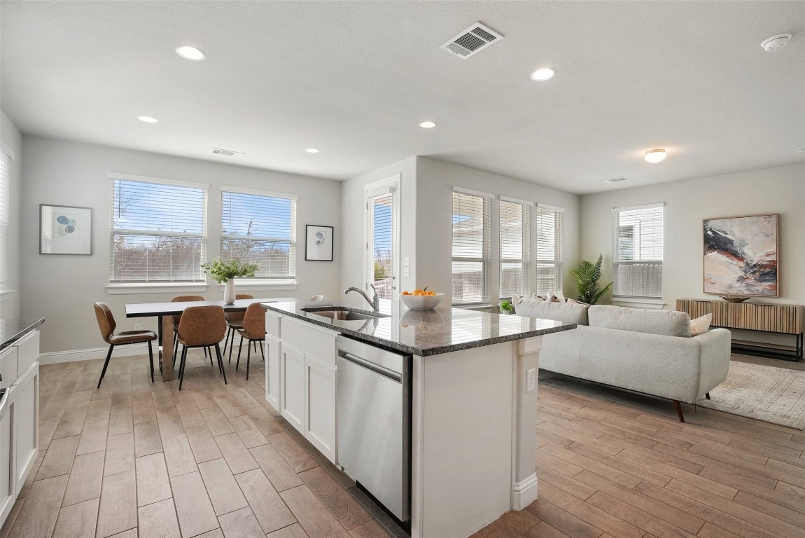 113 Stone Cyn Drive Georgetown, TX 78628 - Photo 12 of 35 a kitchen with sink and cabinets
