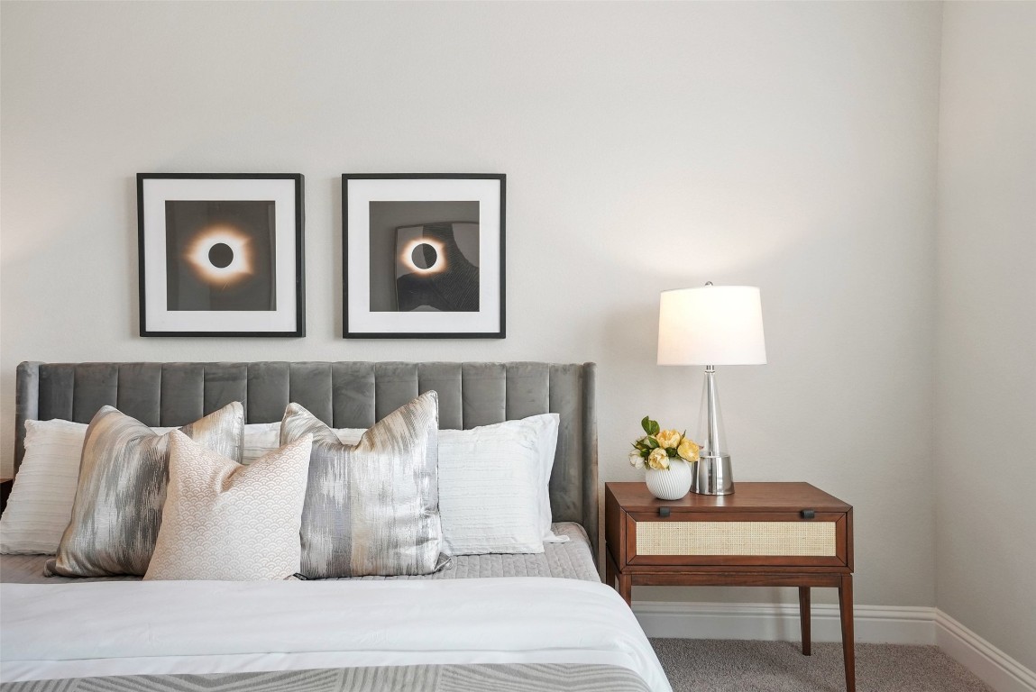 113 Stone Cyn Drive Georgetown, TX 78628 - Photo 18 of 35 a bed room with a bed and a lamp