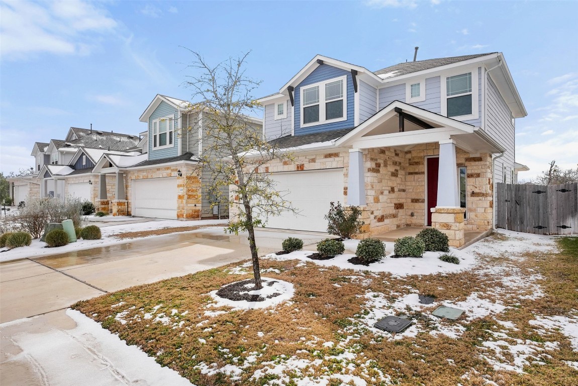 113 Stone Cyn Drive Georgetown, TX 78628 - Photo 2 of 35 a front view of a house with street