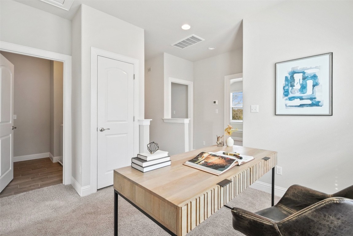 113 Stone Cyn Drive Georgetown, TX 78628 - Photo 23 of 35 a living room with a bed and furniture