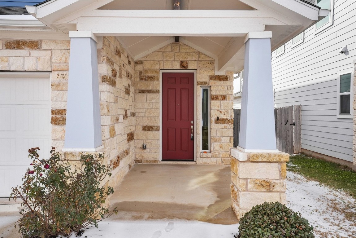 113 Stone Cyn Drive Georgetown, TX 78628 - Photo 3 of 35 a front view of a house with a yard