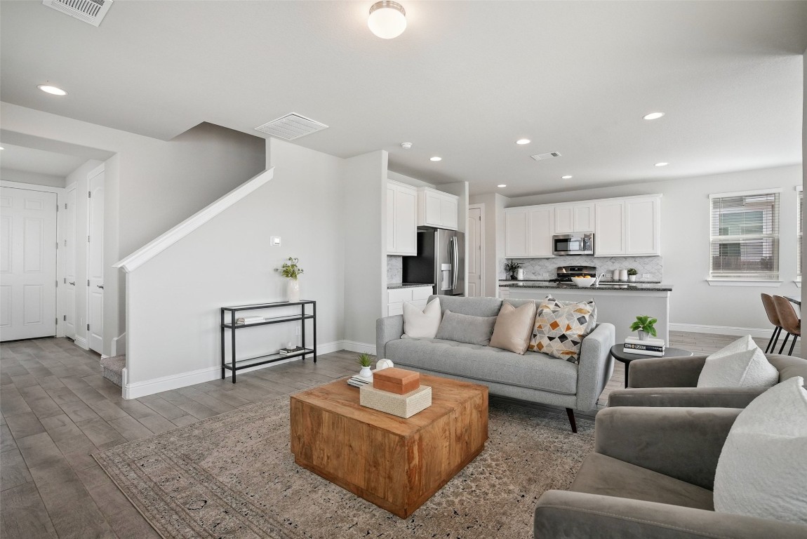 113 Stone Cyn Drive Georgetown, TX 78628 - Photo 6 of 35 a living room with furniture kitchen and a table