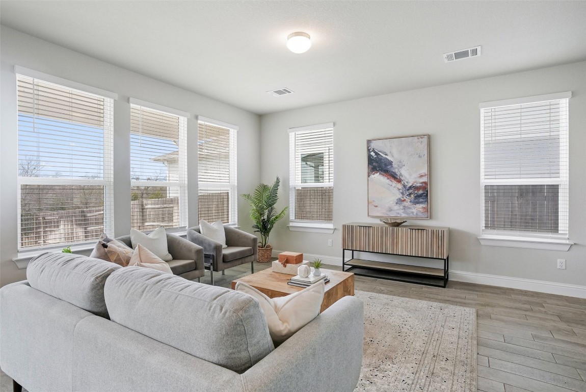 113 Stone Cyn Drive Georgetown, TX 78628 - Photo 8 of 35 a living room with furniture and a large window