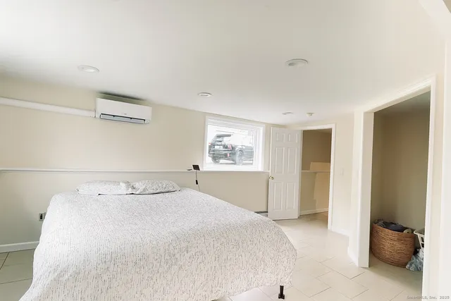 a room with a table and windows