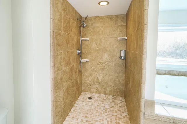 a view of a bathtub in a room