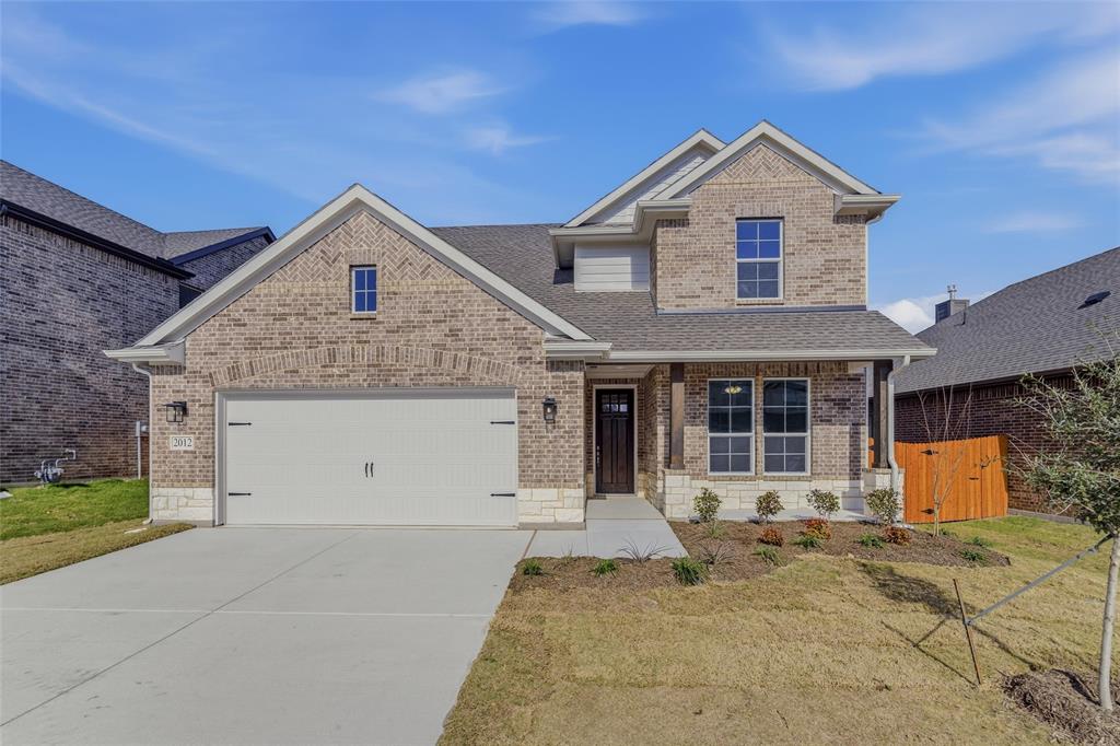 2012 Velora Drive Haslet, TX 76052 - Photo 2 of 33 a front view of a house with a garage