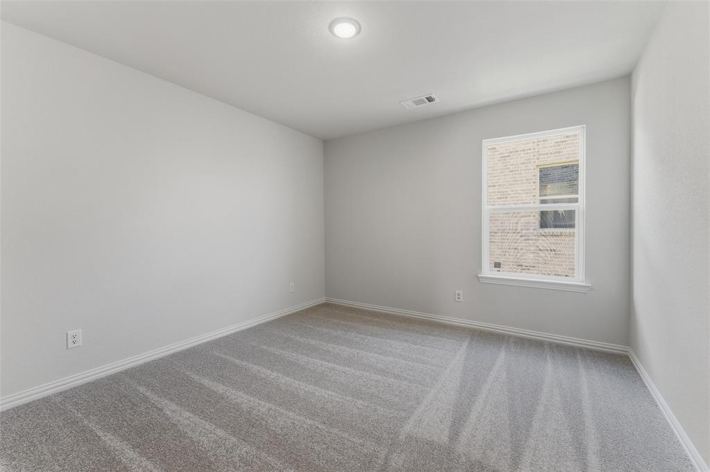 2012 Velora Drive Haslet, TX 76052 - Photo 27 of 33 a view of an empty room with a window