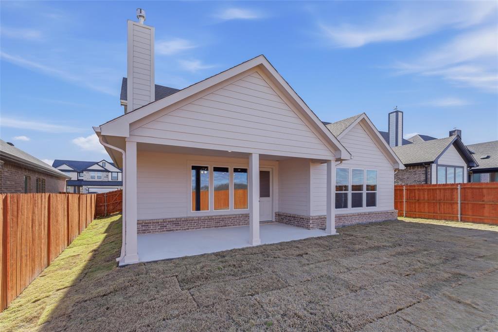 2012 Velora Drive Haslet, TX 76052 - Photo 30 of 33 a front view of a house with a yard and entertaining space