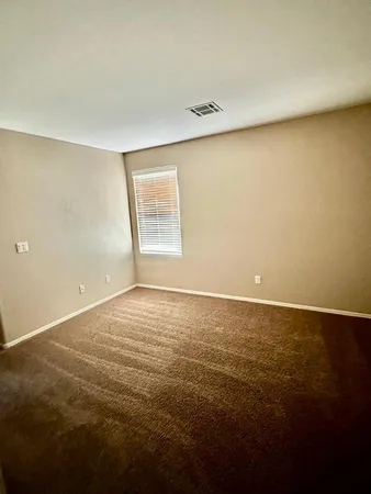 an empty room with a natural light