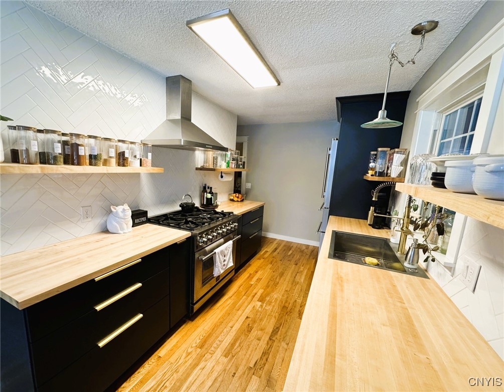 134 Sincerbeaux Road Groton, NY 13073 - Photo 9 of 49 Kitchen with Forno Stove and Refrigerator