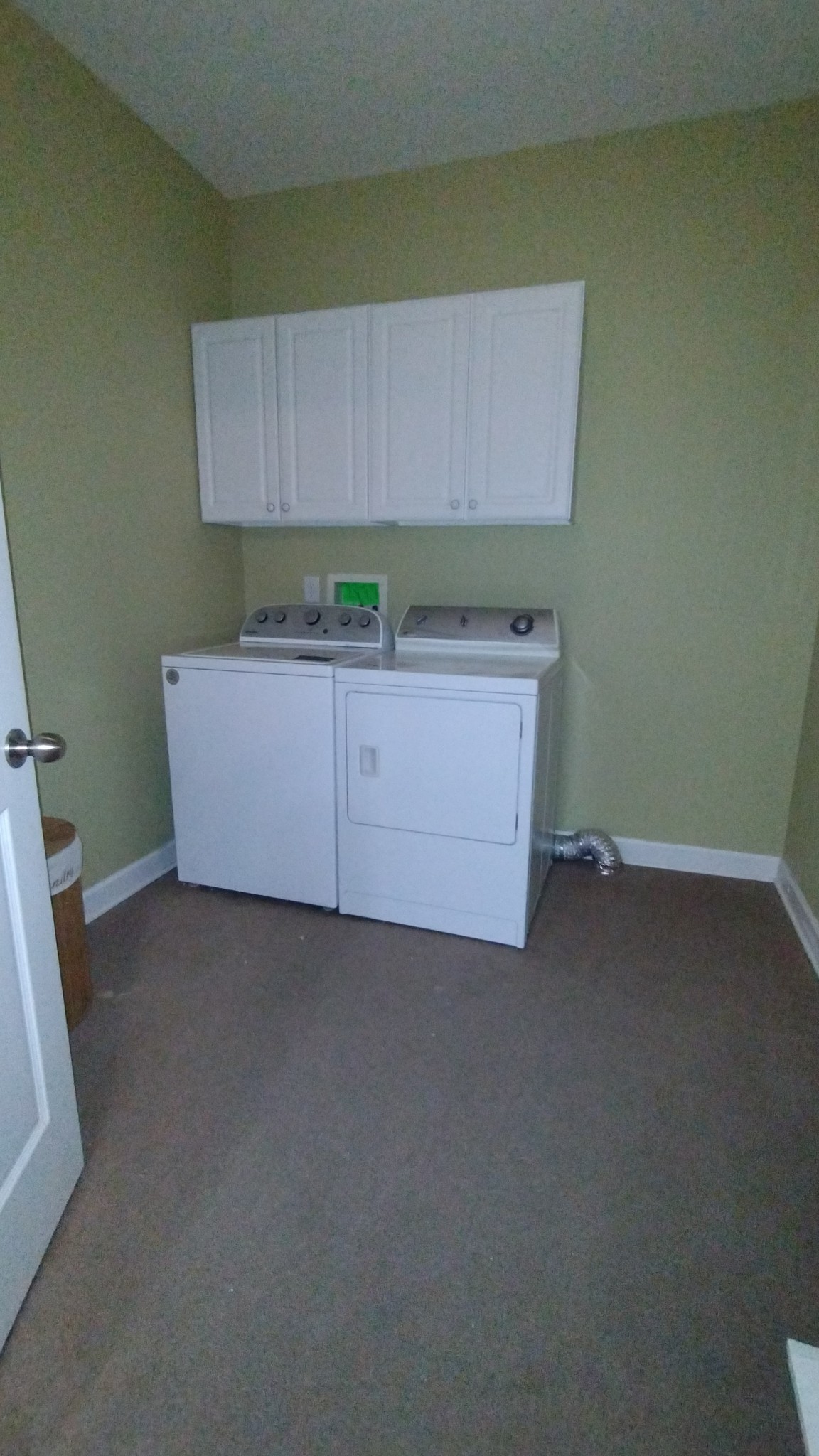 1308 Decatur Circle Franklin, TN 37067 - Photo 20 of 20 a room with a cabinets and a wooden floor