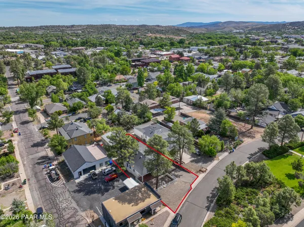 a top view of a house with a yard