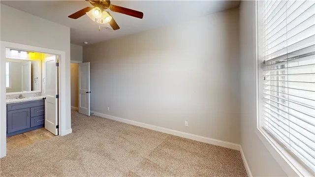wooden floor in an empty room and a window