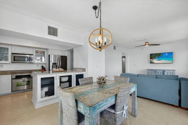 a kitchen with stainless steel appliances granite countertop a stove and a sink