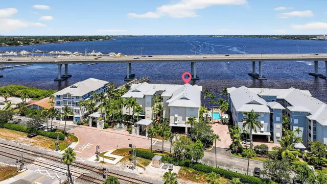 a view of multiple houses with a yard
