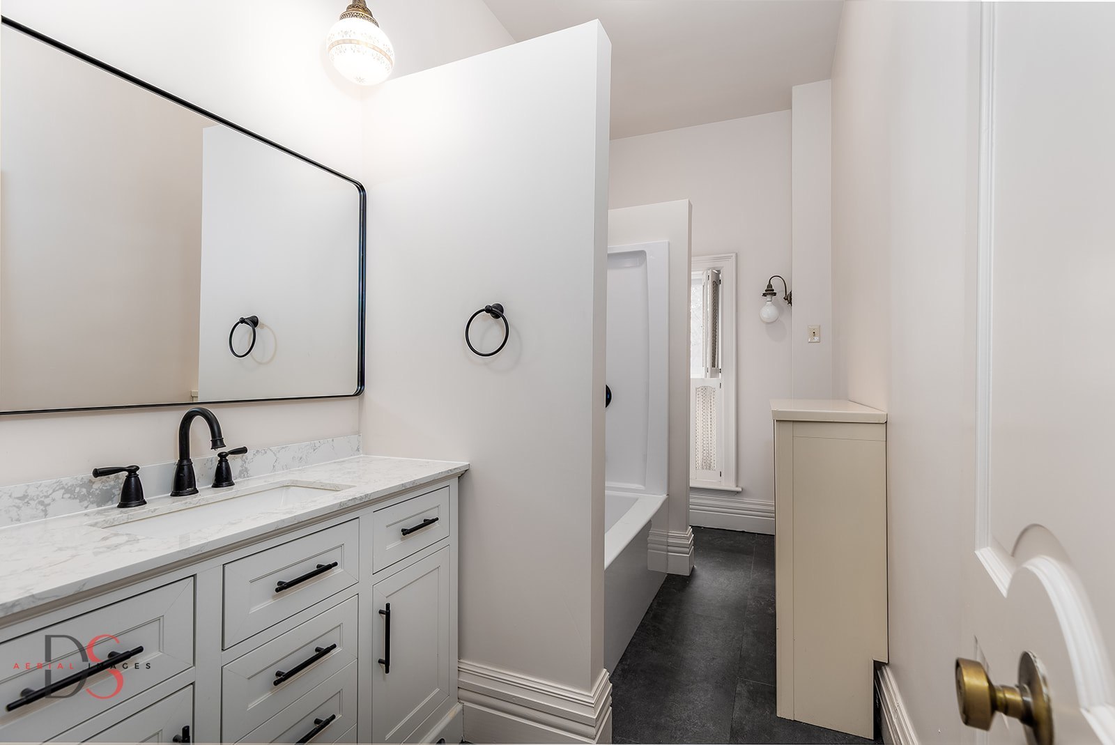 369 West Bluff Street Marseilles, IL 61341 - Photo 29 of 41 a bathroom with a sink and a mirror