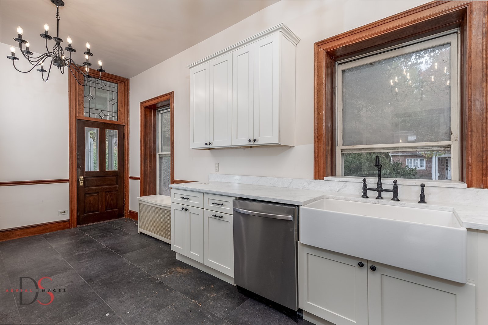 369 West Bluff Street Marseilles, IL 61341 - Photo 9 of 41 a kitchen with a sink cabinets and window