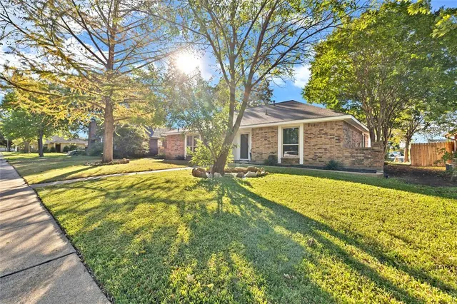 a view of a house with swimming pool