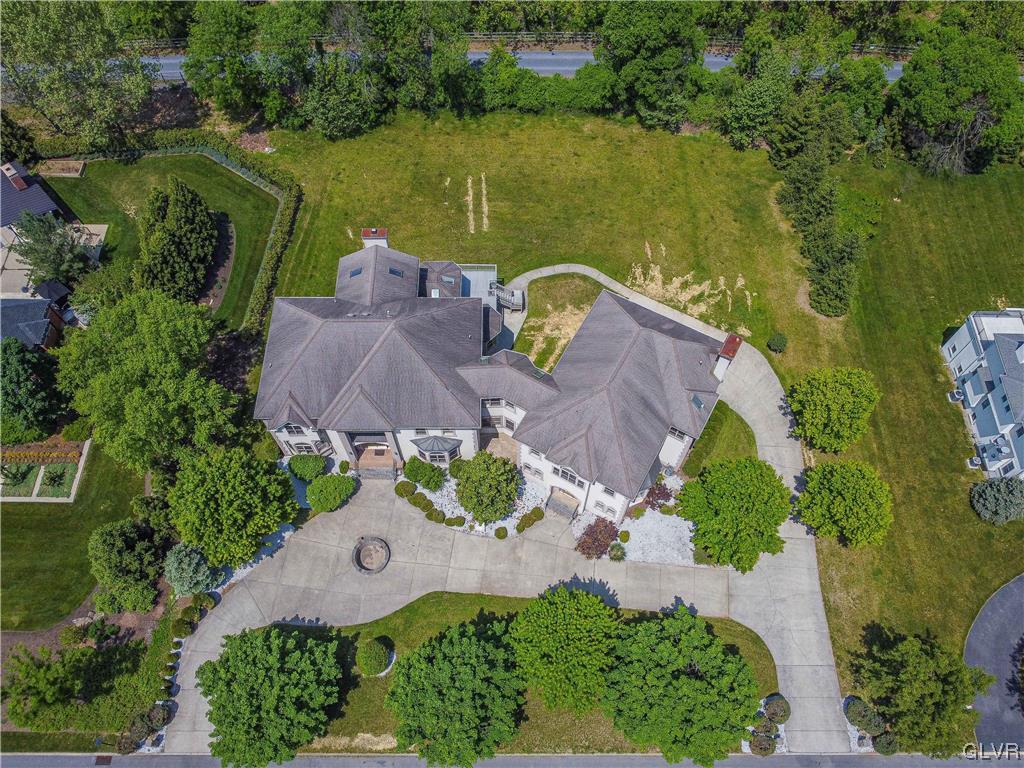 2175 Augusta Drive Center Valley, PA 18034 - Photo 3 of 50 an aerial view of a house with a lake view