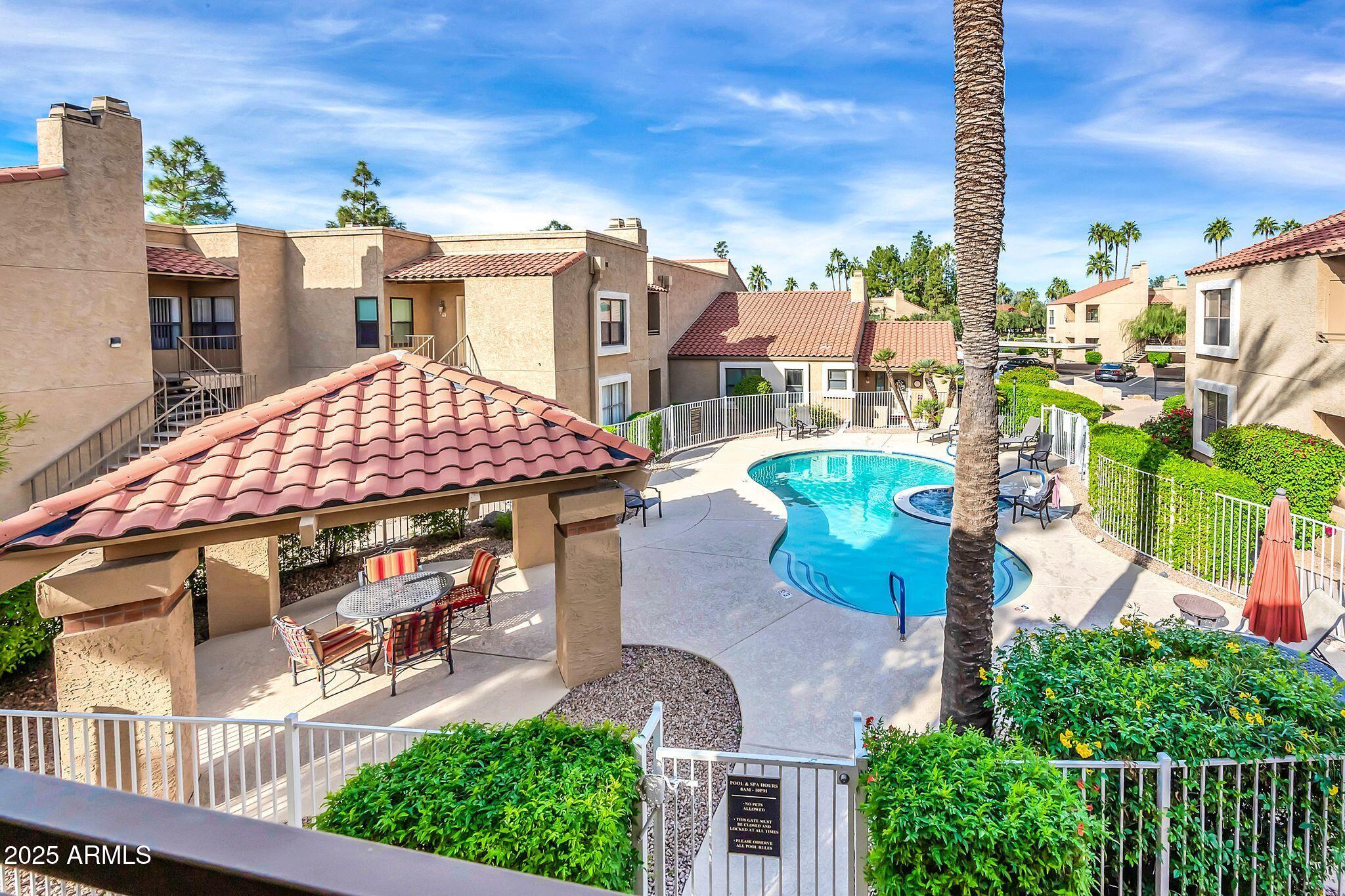 8787 East Mountain View Road, Unit 2100 Scottsdale, AZ 85258 - Photo 1 of 47 a view of a city with tall buildings