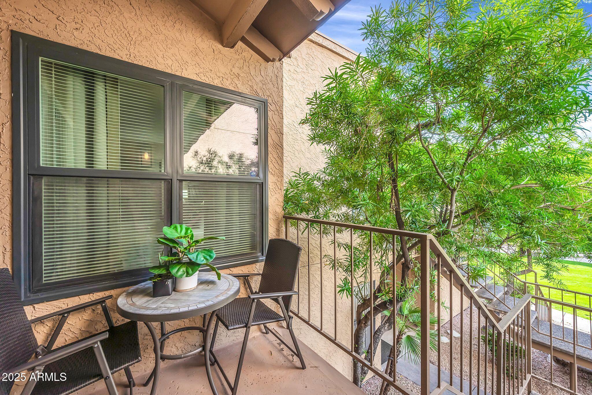 8787 East Mountain View Road, Unit 2100 Scottsdale, AZ 85258 - Photo 3 of 48 a view of a balcony with furniture