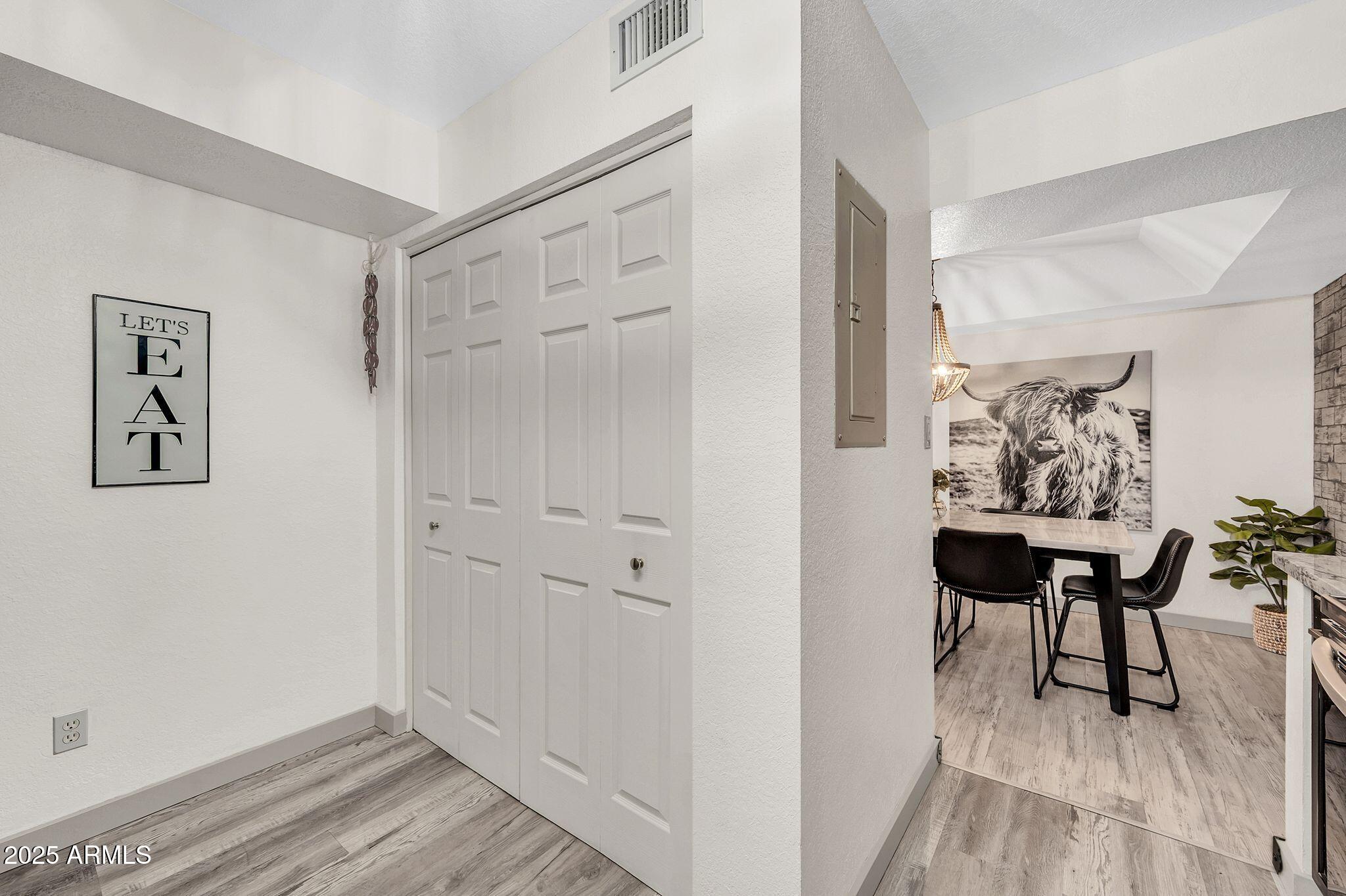 8787 East Mountain View Road, Unit 2100 Scottsdale, AZ 85258 - Photo 41 of 47 a view of a livingroom with furniture and wooden floor