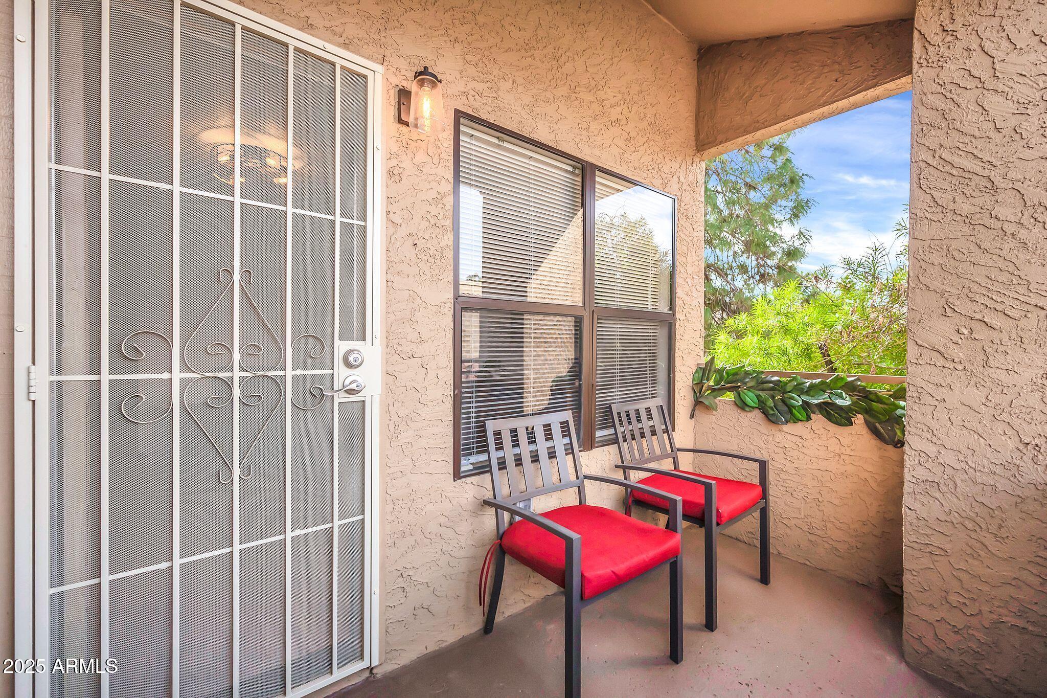 8787 East Mountain View Road, Unit 2100 Scottsdale, AZ 85258 - Photo 6 of 48 a room with furniture and a window