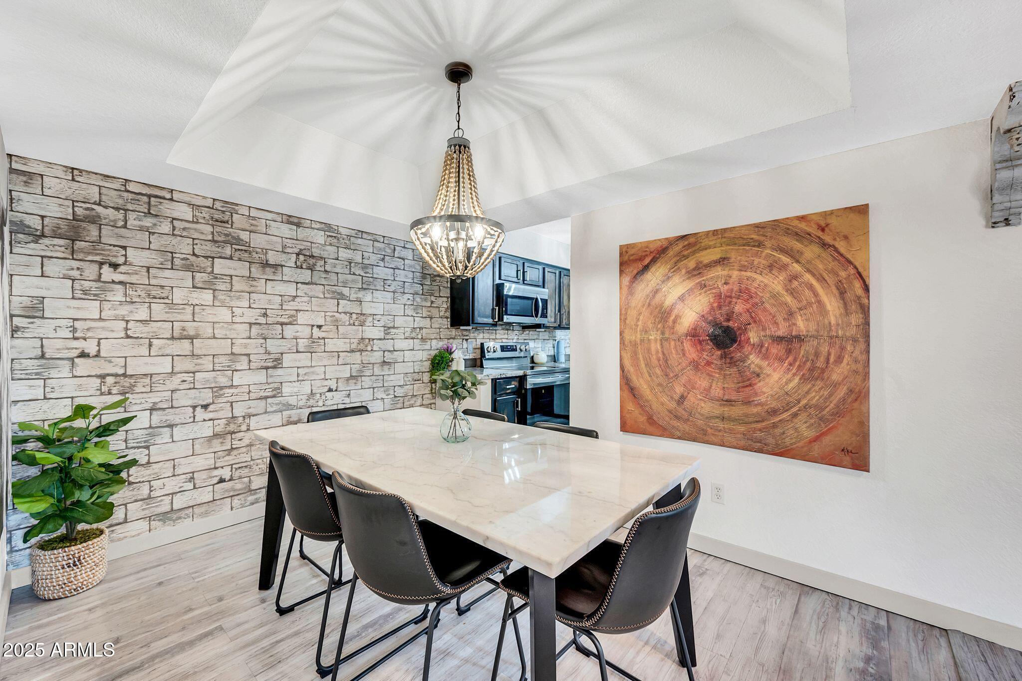 8787 East Mountain View Road, Unit 2100 Scottsdale, AZ 85258 - Photo 10 of 47 a view of a dining room with furniture