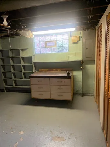 a bathroom with a sink and a shower