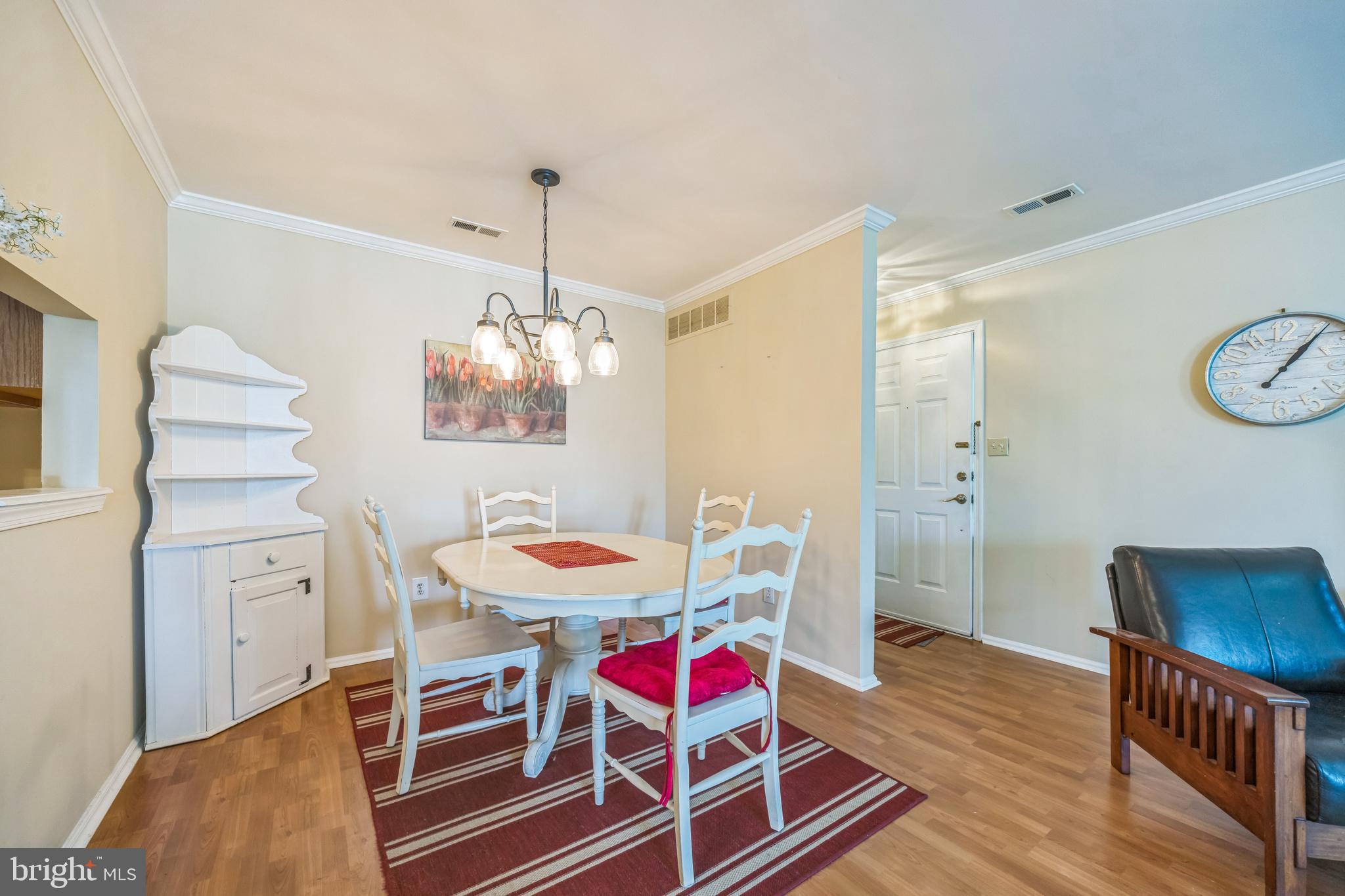 402 B Violet Drive Mount Laurel, NJ 08054 - Photo 14 of 35 a view of a dining room with furniture and wooden floor