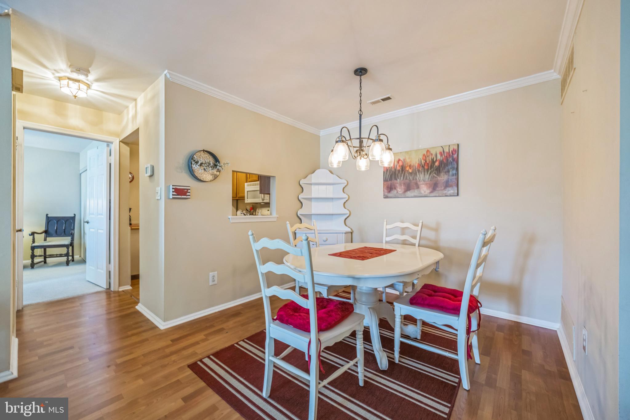 402 B Violet Drive Mount Laurel, NJ 08054 - Photo 16 of 35 a view of a dining room with furniture