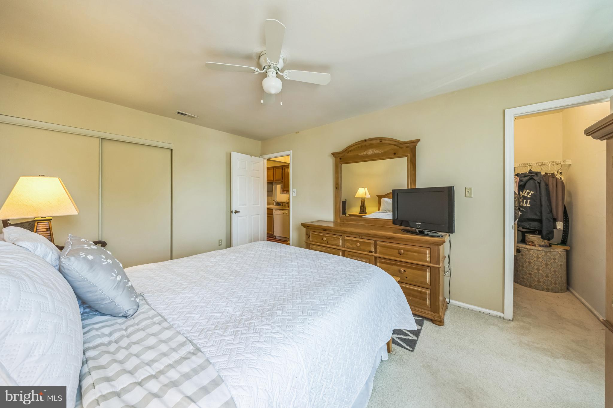 402 B Violet Drive Mount Laurel, NJ 08054 - Photo 24 of 35 a bedroom with a bed and a flat screen tv