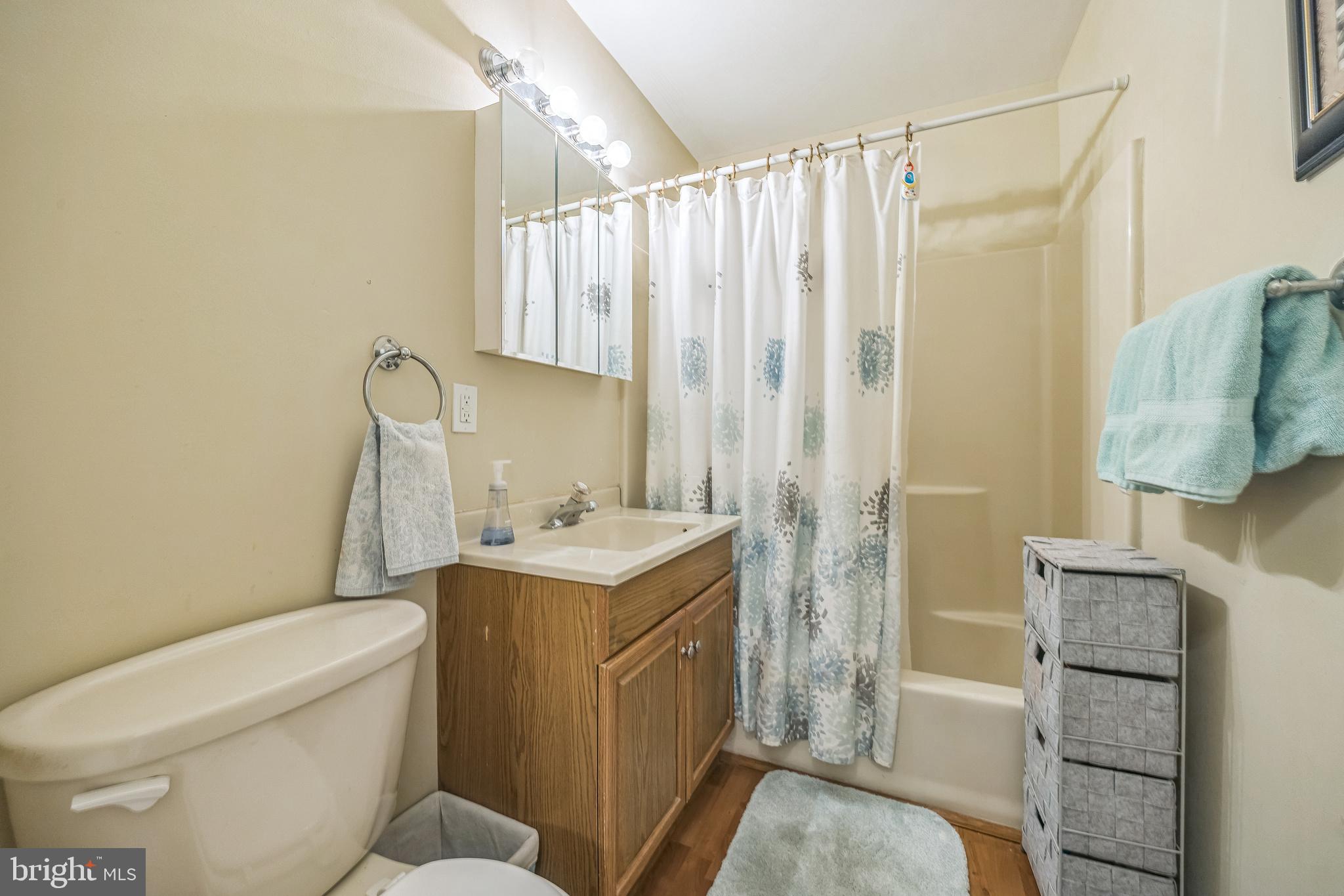 402 B Violet Drive Mount Laurel, NJ 08054 - Photo 26 of 35 a bathroom with a granite countertop sink toilet and shower