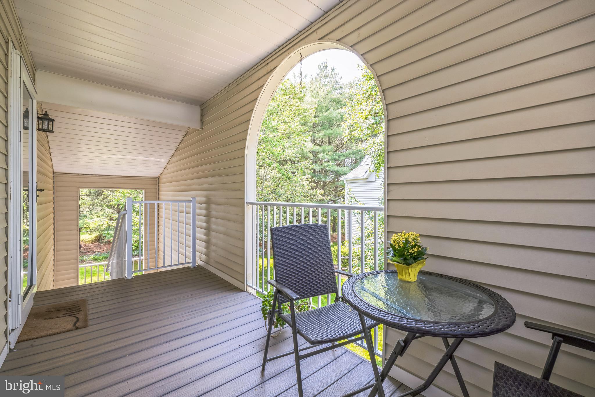 402 B Violet Drive Mount Laurel, NJ 08054 - Photo 3 of 35 a view of a chair and table in back of the house