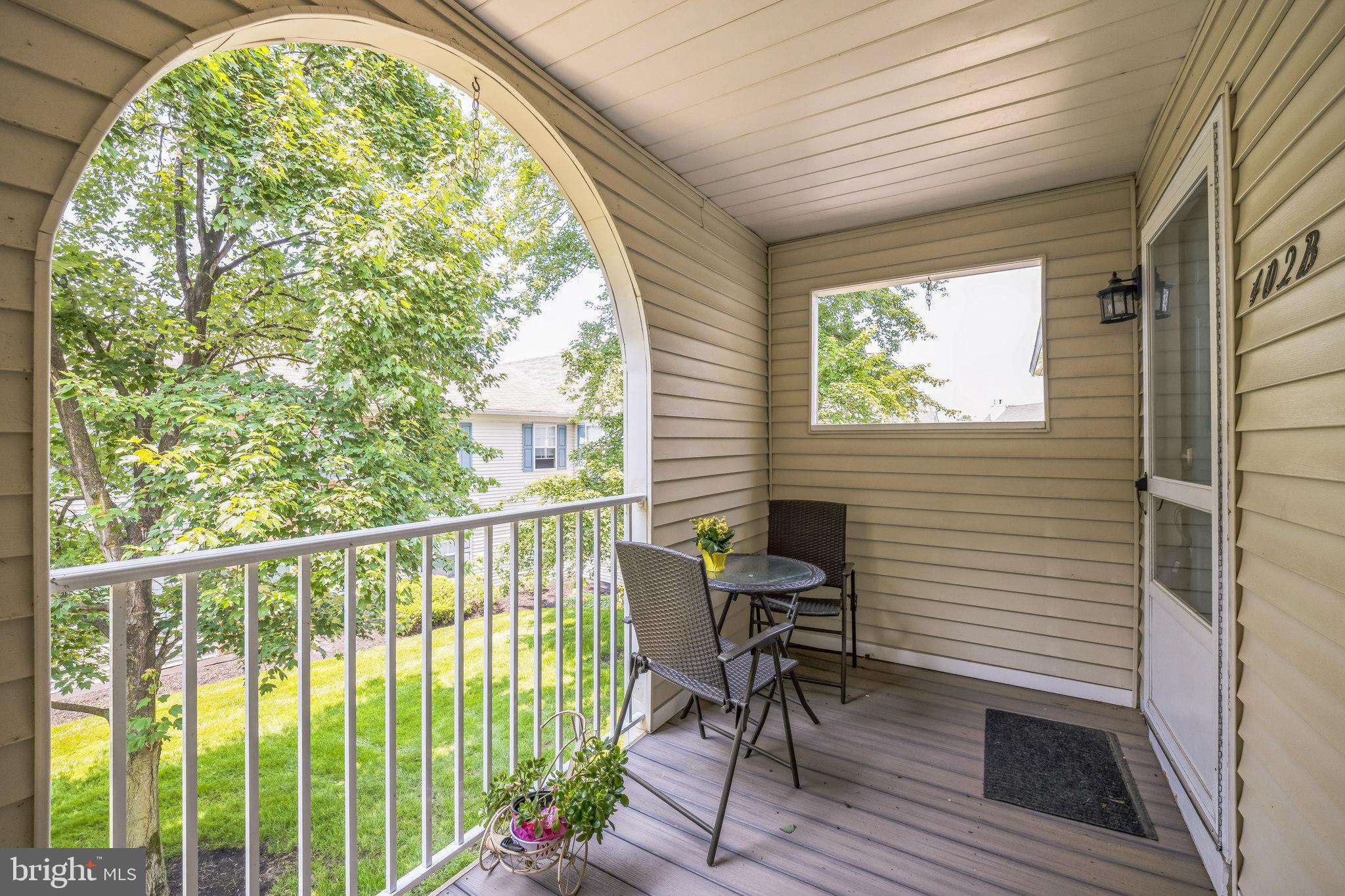 402 B Violet Drive Mount Laurel, NJ 08054 - Photo 4 of 35 a view of a two chairs in the balcony
