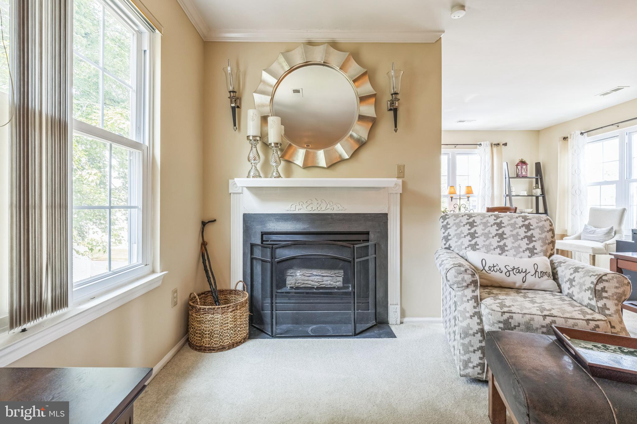 402 B Violet Drive Mount Laurel, NJ 08054 - Photo 8 of 35 a living room with furniture and a fireplace