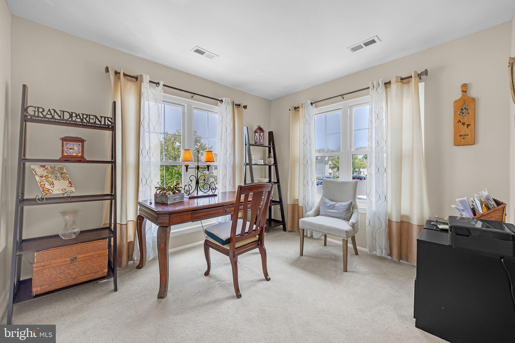 402 B Violet Drive Mount Laurel, NJ 08054 - Photo 10 of 35 a room with furniture and a window