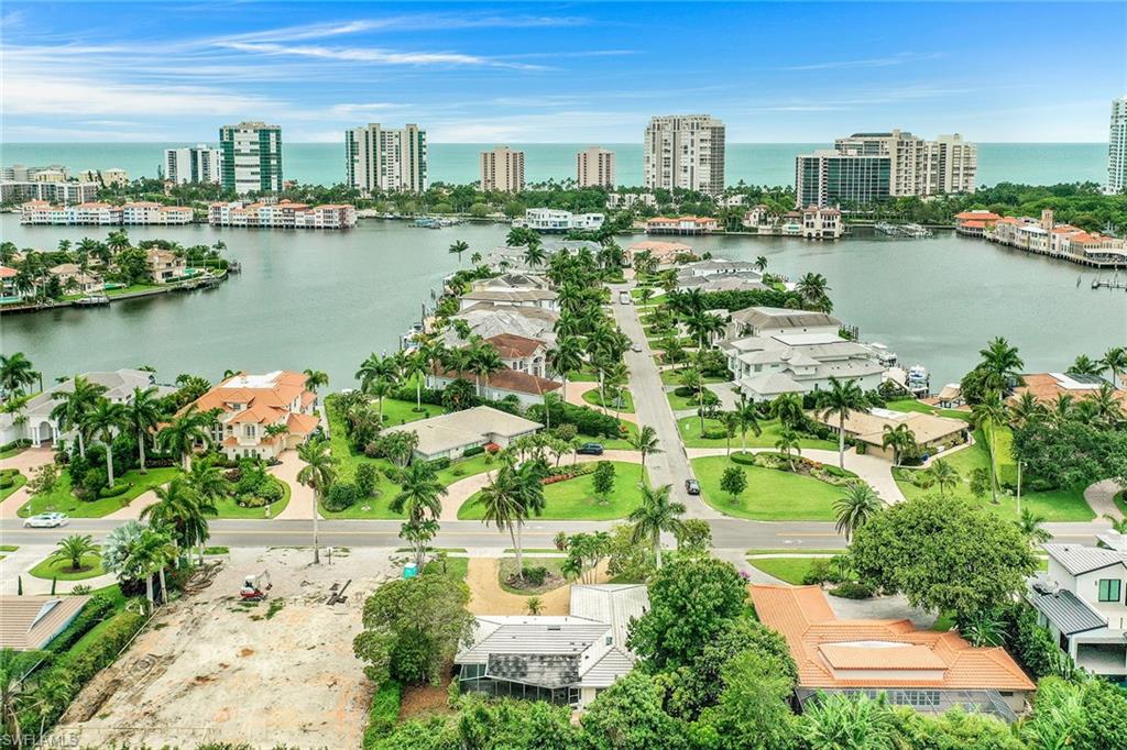 3888 Crayton Road Naples, FL 34103 - Photo 28 of 29 a view of a city with tall buildings