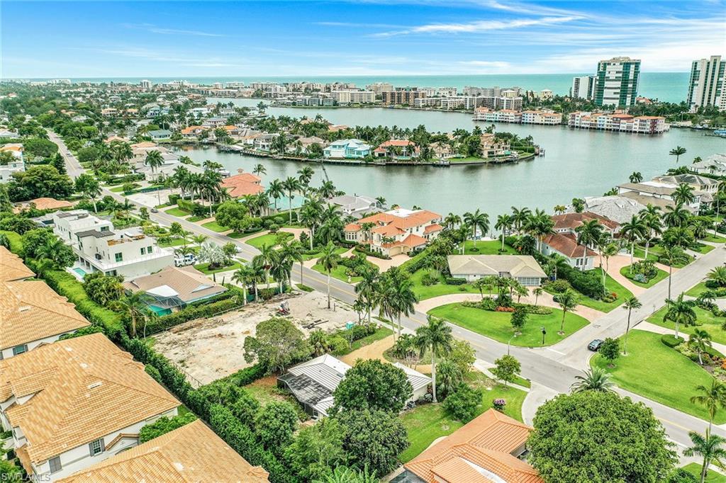 3888 Crayton Road Naples, FL 34103 - Photo 29 of 29 an aerial view of a city with lots of residential buildings lake and ocean view