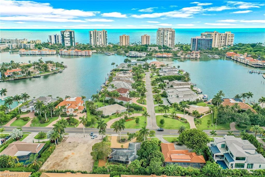 3888 Crayton Road Naples, FL 34103 - Photo 4 of 29 an aerial view of multiple house