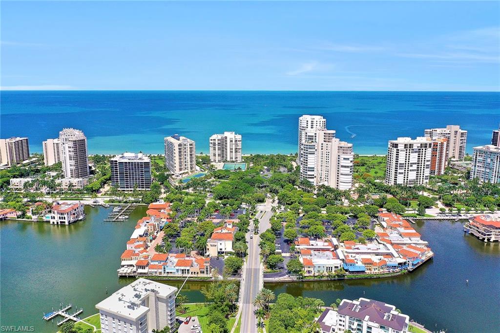 3888 Crayton Road Naples, FL 34103 - Photo 5 of 29 a city view with tall buildings