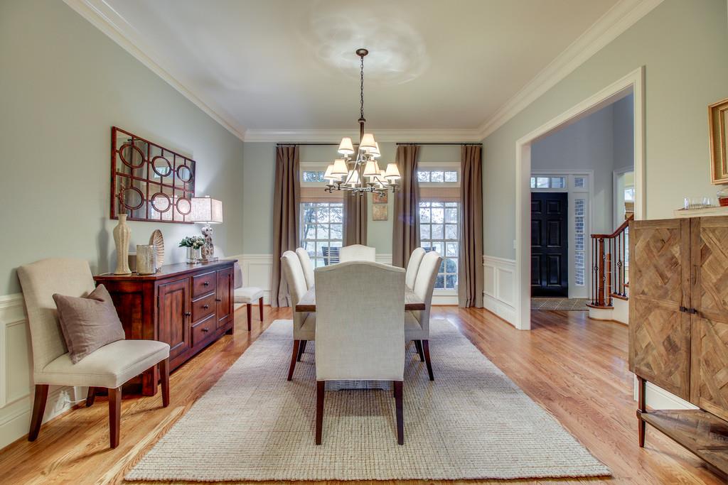 129 Page Road Nashville, TN 37205 - Photo 5 of 20 a view of a dining room with furniture window and wooden floor