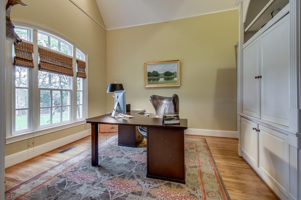 129 Page Road Nashville, TN 37205 - Photo 6 of 20 a view of a workspace with furniture and a window