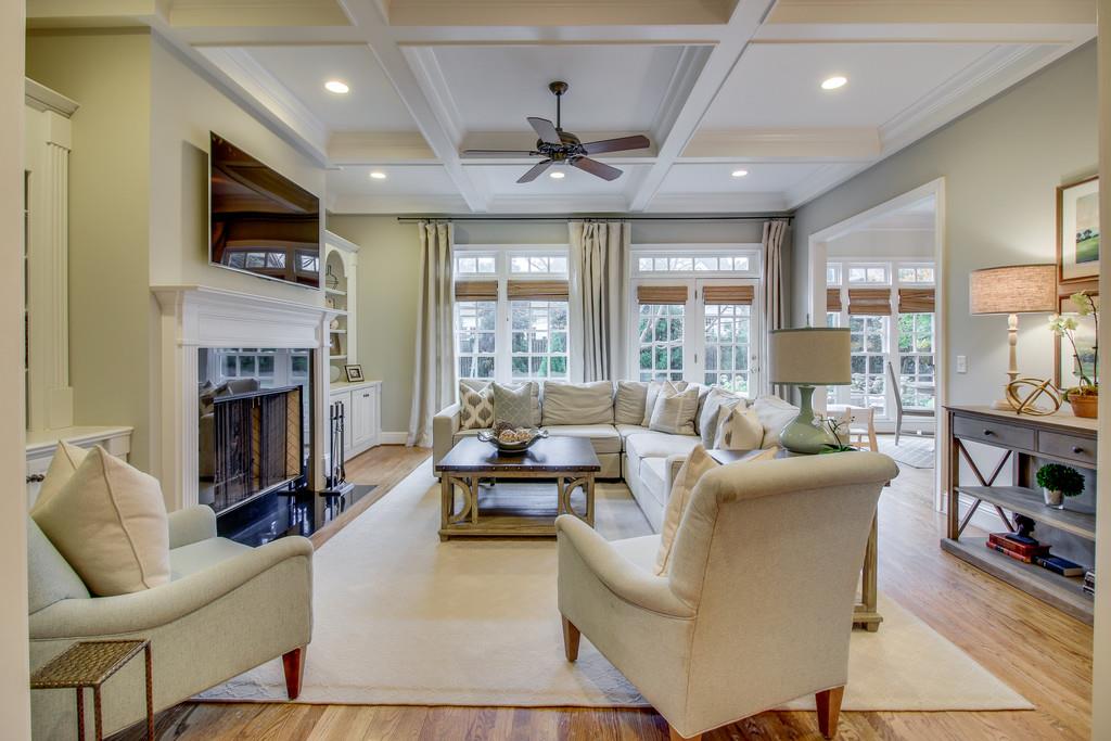 129 Page Road Nashville, TN 37205 - Photo 7 of 20 a living room with fireplace furniture and a flat screen tv