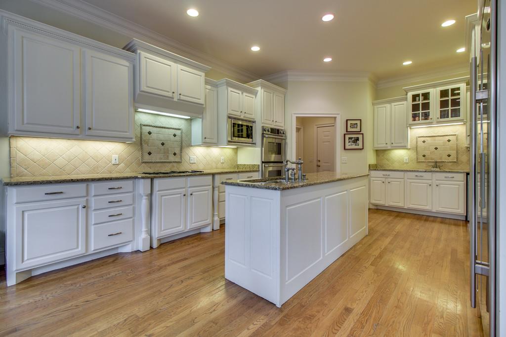 129 Page Road Nashville, TN 37205 - Photo 9 of 20 a large kitchen with cabinets